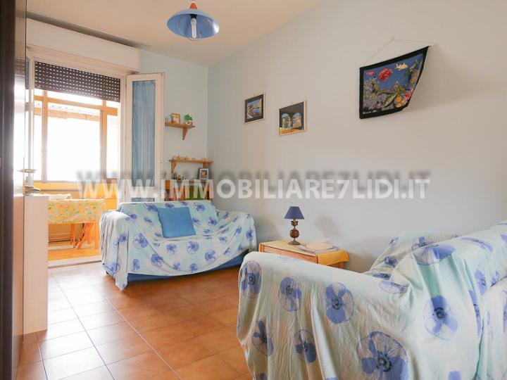 soggiorno con angolo cottura