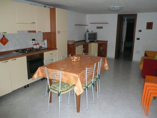 soggiorno con angolo cottura