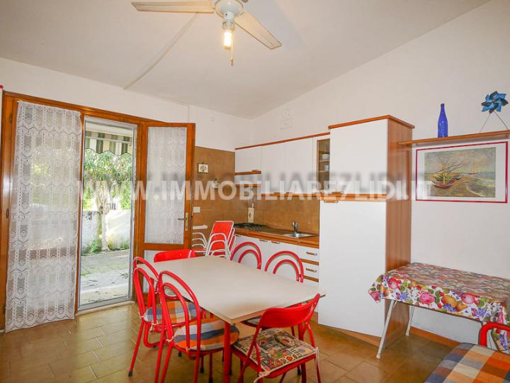 soggiorno con angolo cottura