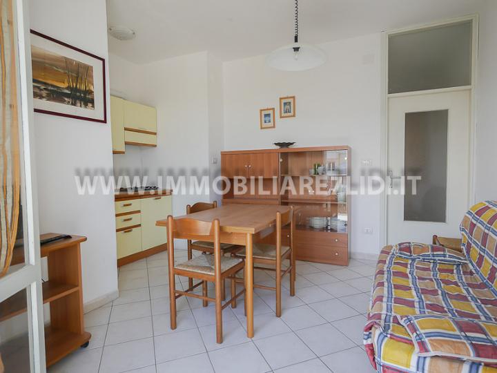 soggiorno con angolo cottura