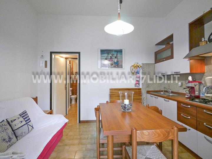 soggiorno con angolo cottura