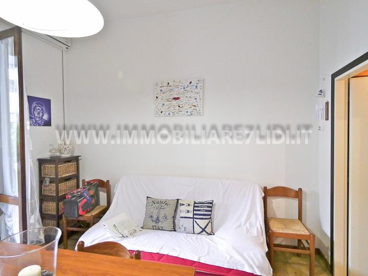 soggiorno con angolo cottura