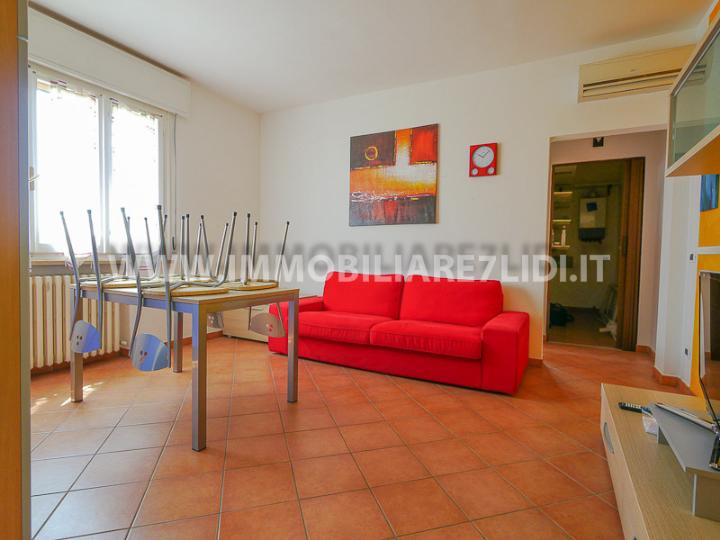 soggiorno con angolo cottura