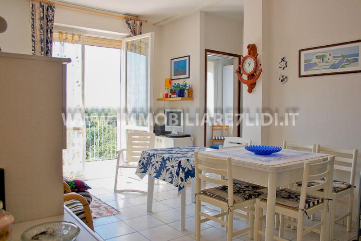 soggiorno con angolo cottura