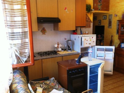 soggiorno con angolo cottura