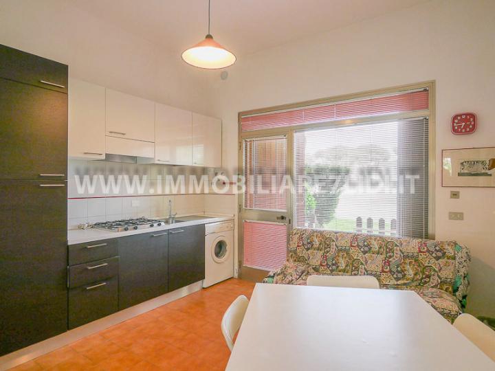 soggiorno con angolo cottura