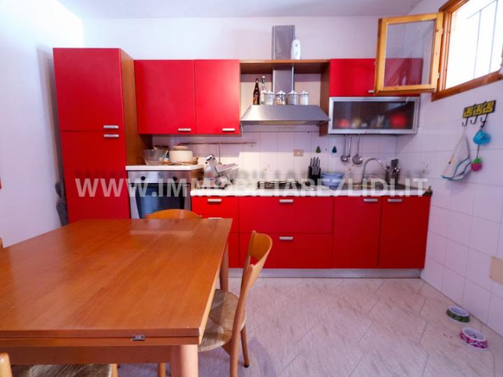 soggiorno con angolo cottura