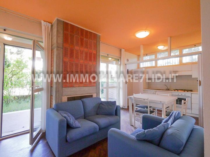 soggiorno con angolo cottura