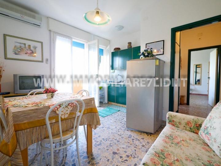 soggiorno con angolo cottura