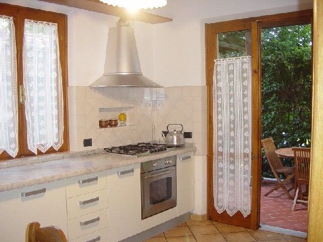 Cucina abitabile con veranda