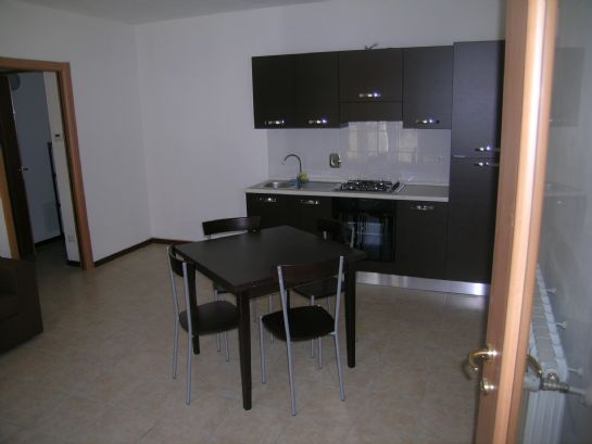 Soggiorno con cucina a vista