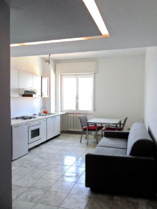 Soggiorno con cucina a vista