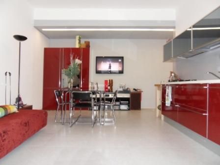 Soggiorno con cucina a vista