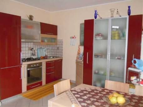 soggiorno con angolo cottura