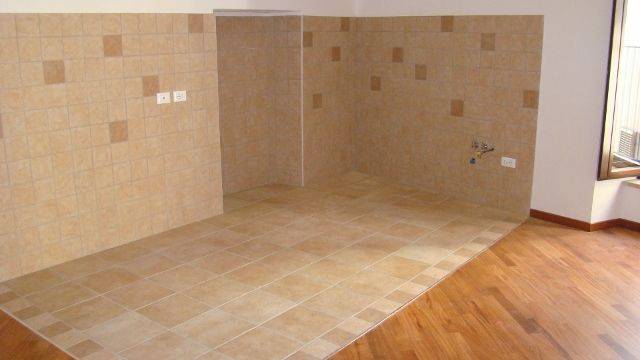 sala pranzo con zona cucina (640x360).jpg