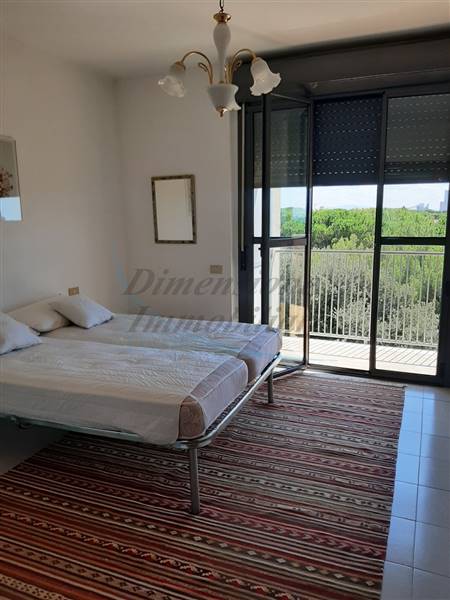 Camera matrimoniale con affaccio sulla terrazza.jp